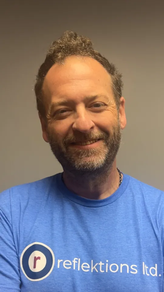 Justin Livingston, CEO and Co-Founder of Reflektions Ltd.